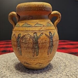 Handcrafted Tan Ceramic Vase with Artistic Figures